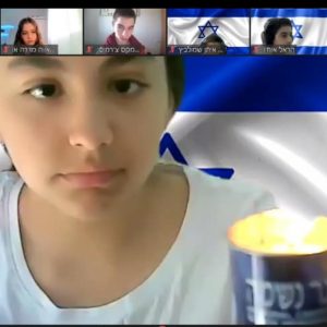יום השואה הבינלאומי – תלמידת אורט כרמים מדליקה נר בטקס בינלאומי